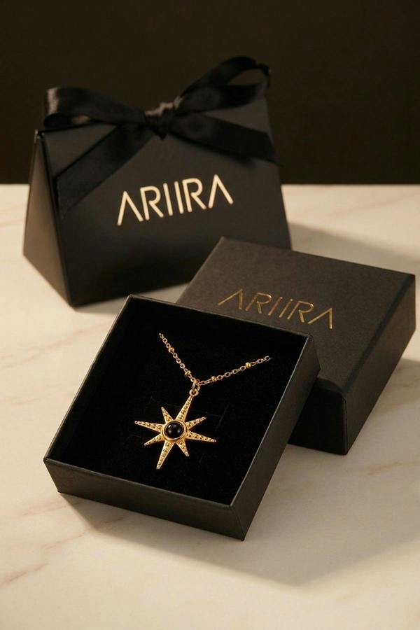 ARIIRA Gaia Gold Tone Starburst Pendant Necklace