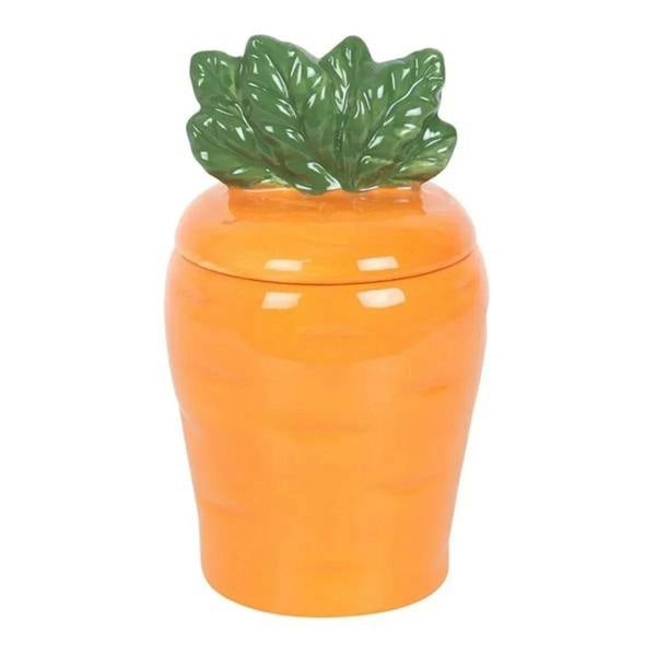 Orange carrot-shaped wax warmer with green leaf lid, glossy ceramic design