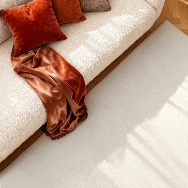 Fine Boucle Wool Rug Knots Natural White sound-absorbing, durable pile.