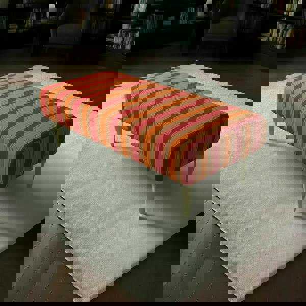 Large rectangular coffee table seat with multi-toned abstract fabric and solid wood legs