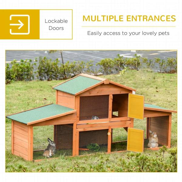 Outdoor wooden rabbit hutch with green-roof runs and multiple lockable entry doors