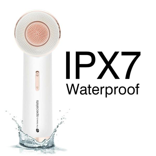 The PURE CLEANSE Deep Cleansing & Exfoliating Facial Brush by Rio the Beauty Specialists is shown with water splashes and a circular brush head, highlighting its IPX7 Waterproof design—perfect for your skincare routine.