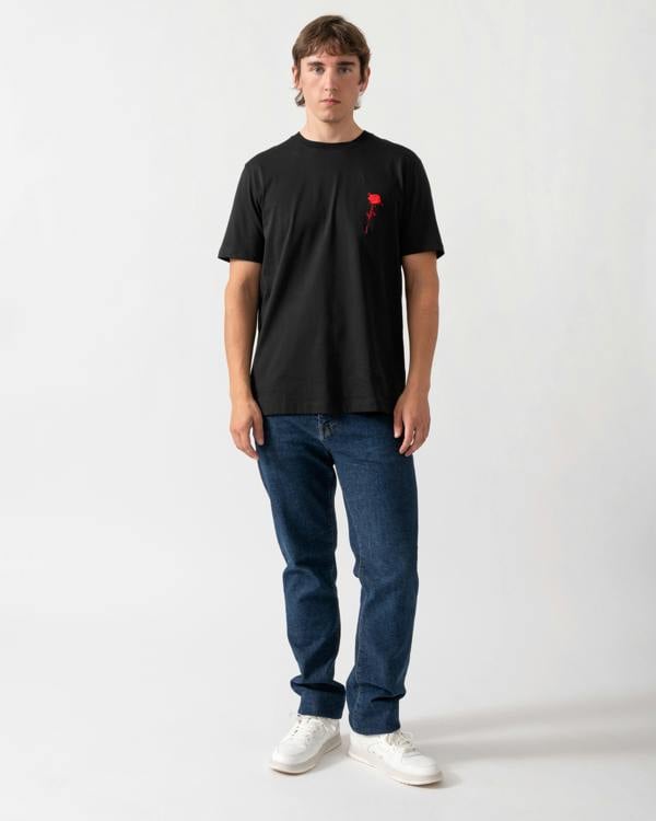 full length model wearing a HUGO Diflow Mens T-Shirt in Black 001