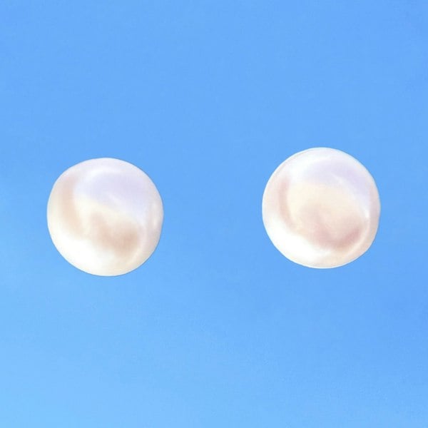 Tiny pearl studs handcrafted from sterling silver by LENAE London.