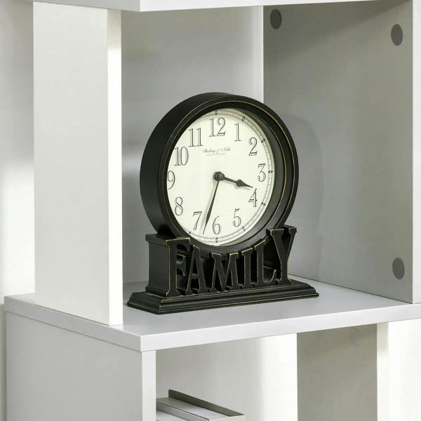 White and light grey bookshelf cubby holding an analog clock decoration.