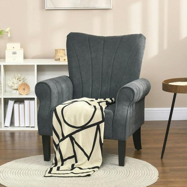 Grey upholstered armchair with rolled arms and tall back
