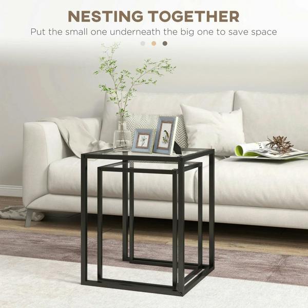Nesting side tables with black steel frames and clear tempered glass top surfaces