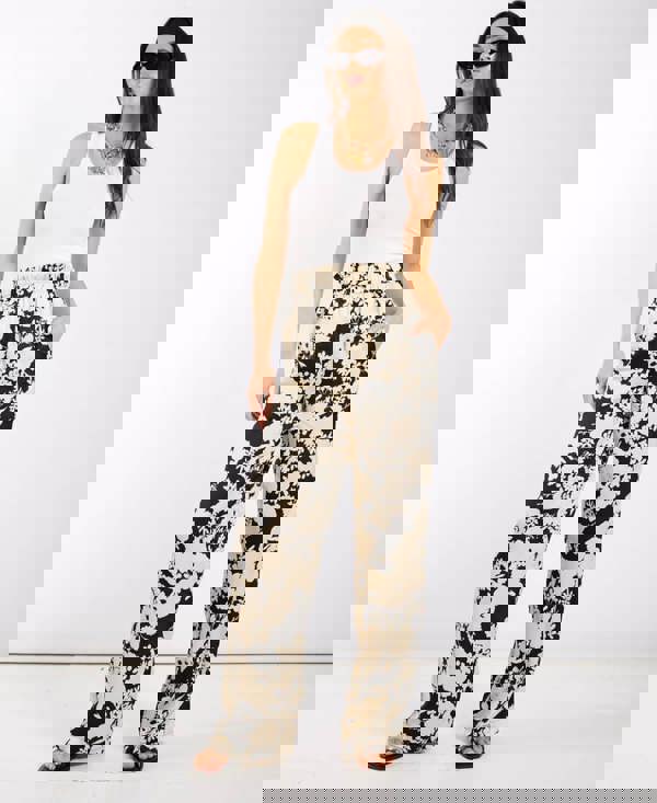 Ivory black printed wide leg trousers