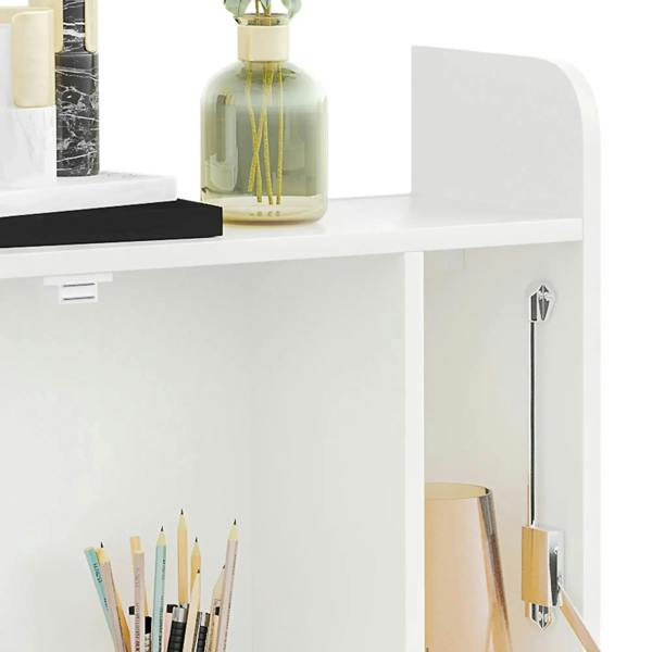 White wall-mounted desk close-up with shelf edge and metal lift hinge mechanism