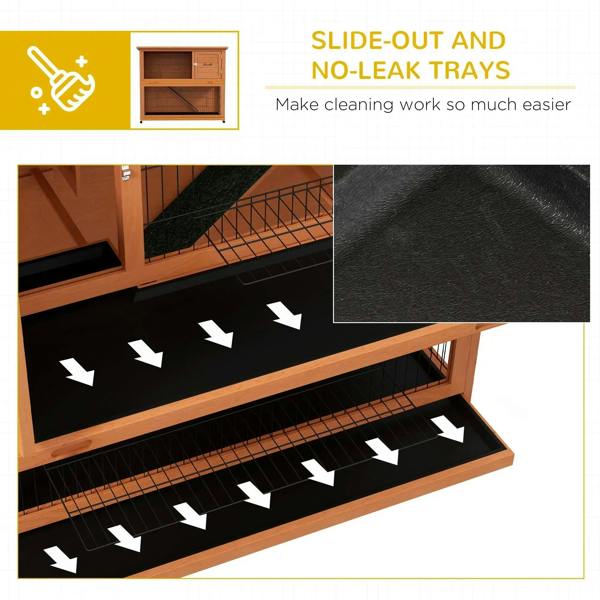 Orange rabbit hutch with slide-out cleaning trays beneath the ramp and wire sides