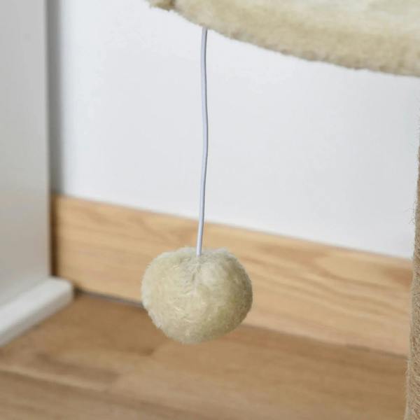 Beige hanging pom ball attached to a string from the cat tree perch