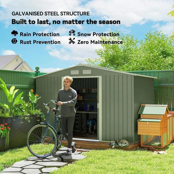 Light green metal garden shed with open door and included accessories visible outside