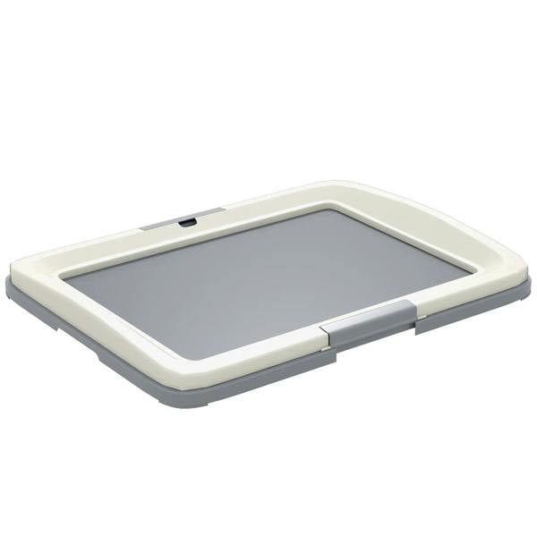 Grey dog toilet tray with raised rim and open top