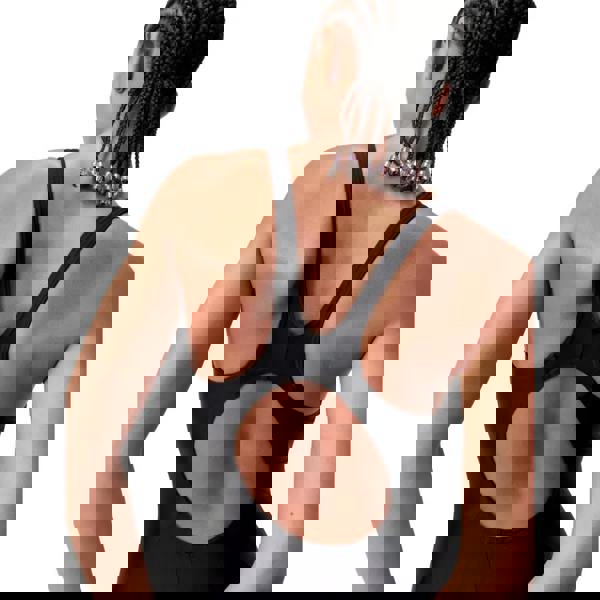 Black Speedo racerback sports bra with cutouts in creora highclo