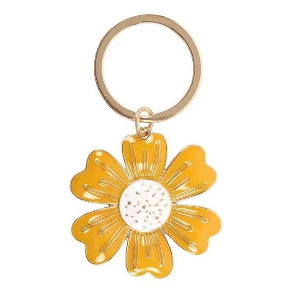 Gold-tone daisy charm keyring with yellow flower and white center