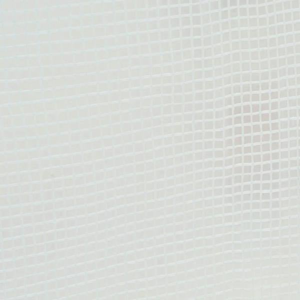 White grid mesh greenhouse cover fabric close-up with fine square pattern