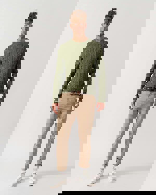 Model wearing GANT Mens Cotton Cable Knit Crew Neck Jumper in 379 Dry Herb Green - Full Length