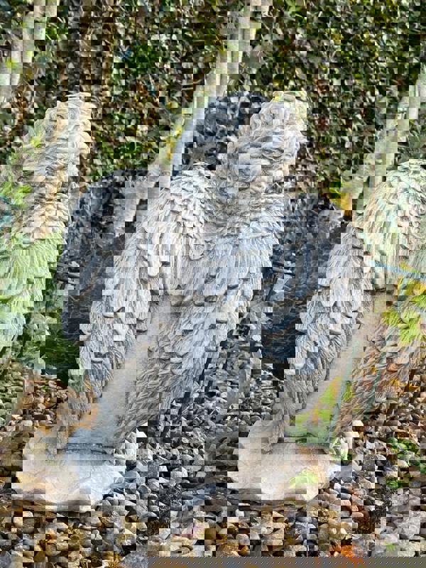 Stone Cast Cherub Ornament with Teddy on Hand