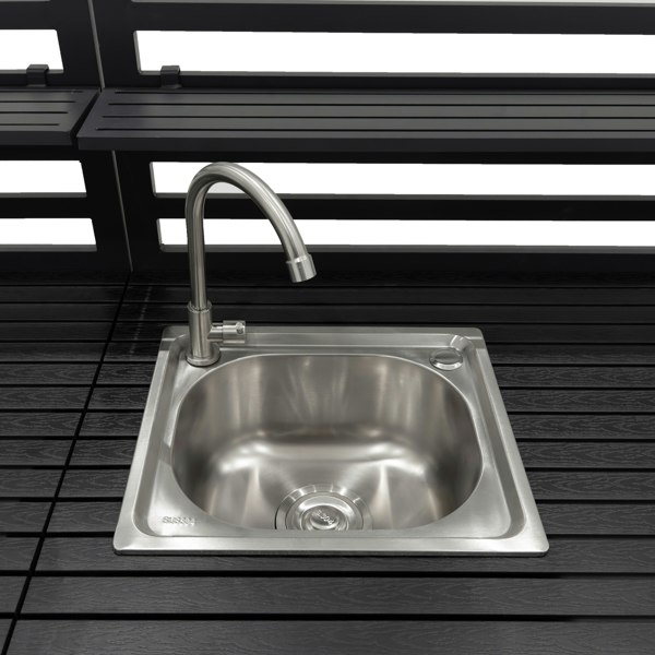 Sleek stainless steel sink with a modern faucet, set on a dark wooden countertop, ideal for outdoor kitchen setups