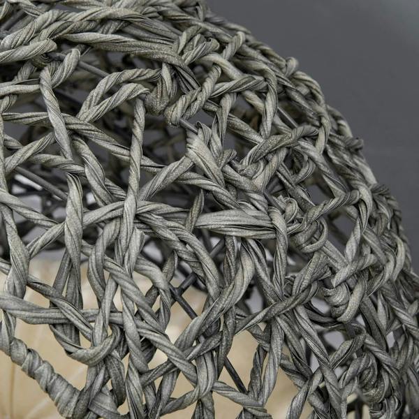 Close-up of grey braided rattan pattern on the cat bed basket house