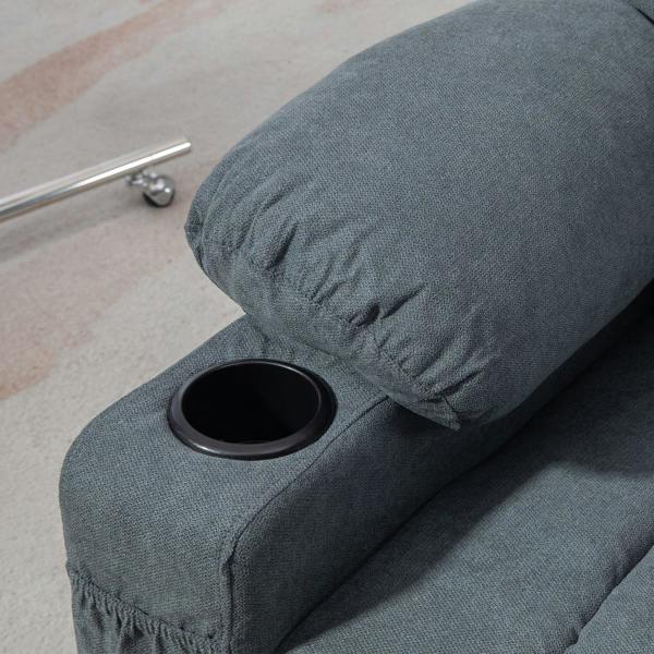 Grey upholstered armrest with built-in cup holder opening