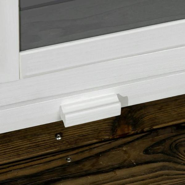 Rabbit hutch base close-up with white frame and metal fastener on wooden floor