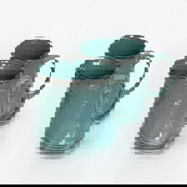 Teal green reactive glaze mugs