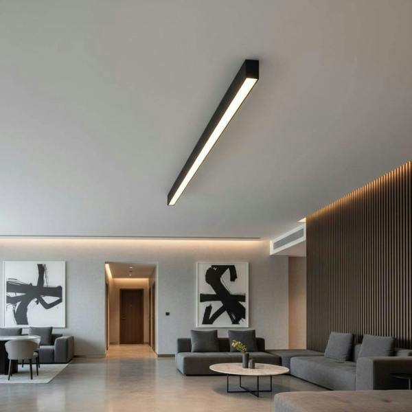 black surface mounted linear light fitted in a modern hotel reception