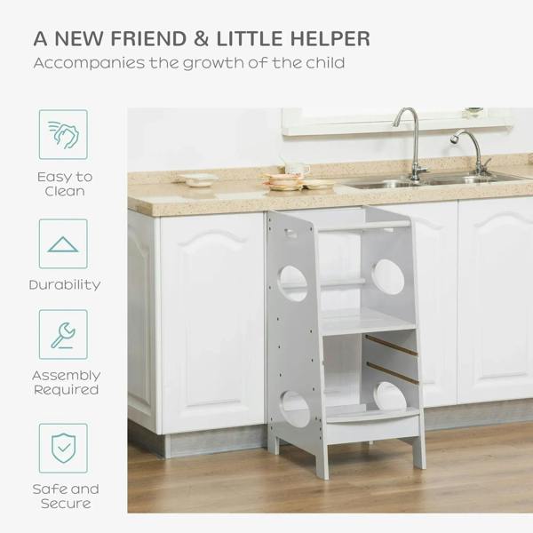 Kids step stool tower next to kitchen counter, white frame with open steps