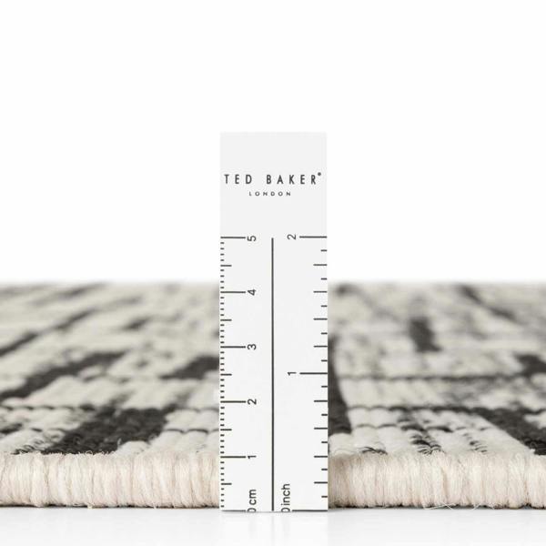 Rug with a ruler for scale, featuring the Ted Baker London brand.