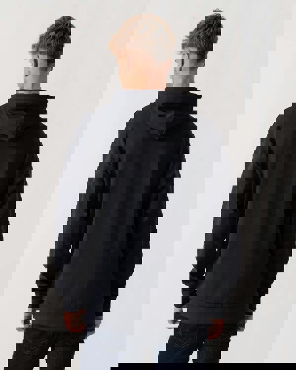 Model wearing BOSS Green Sly Zone Mens Pullover Hoodie in Dark Blue 403 - Back