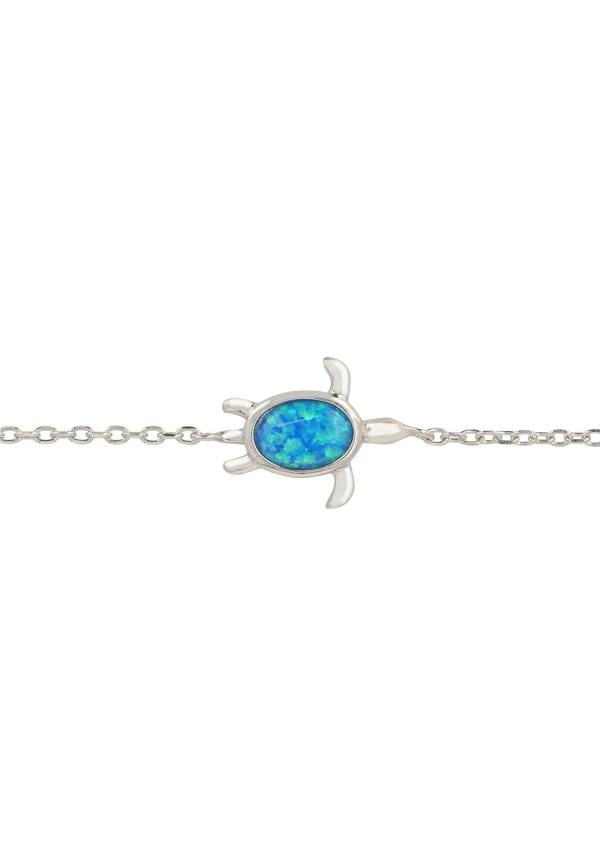 Silver turtle-shaped bracelet with a blue stone on a white background