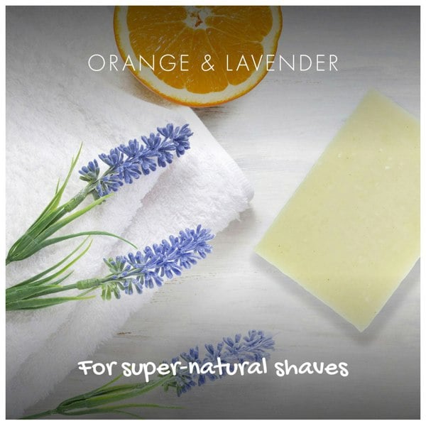 Lavender and orange ingredients on a table with soap bar
