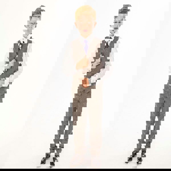 Boy wearing grey tweed trousers and waistcoat from UK Flower Girl Boutique