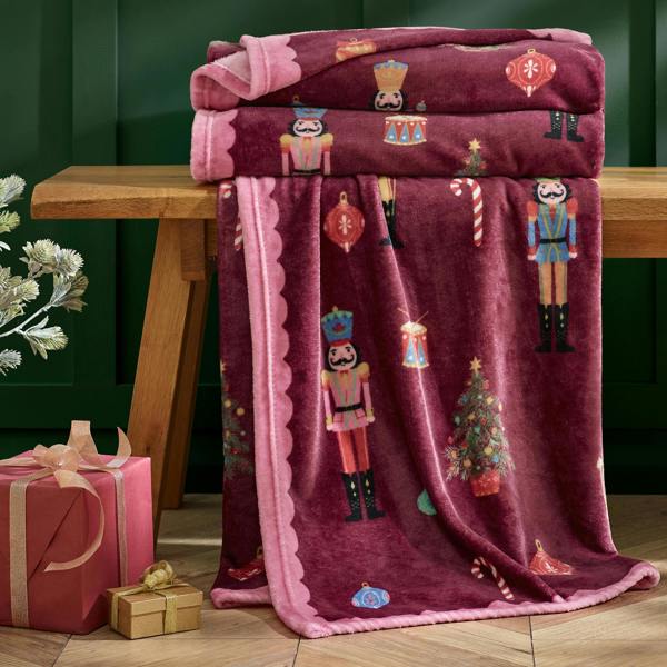 Catherine Lansfield Christmas Nutcracker Fleece Cosy Blanket Throw Plum