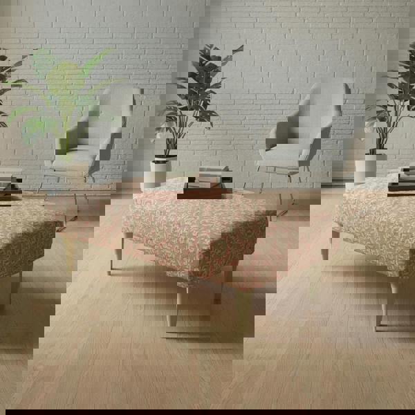 Sleek rectangular ottoman with solid wood frame and painterly designer fabric as a statement piece