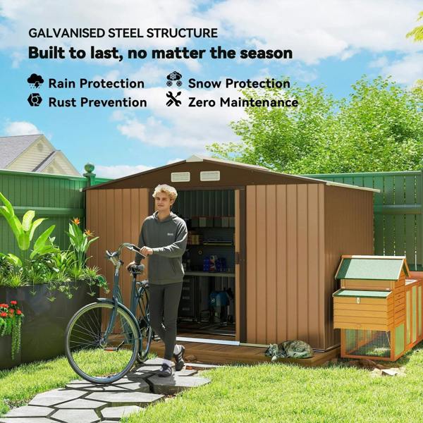 Light brown metal garden shed with open doorway and side ventilation vents