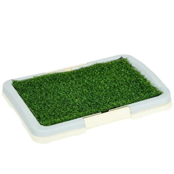 Portable puppy training pad with green artificial grass top and light gray tray base