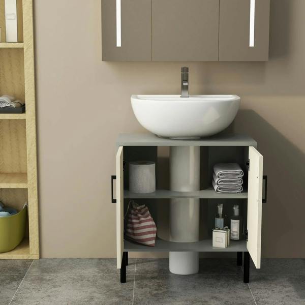 Bathroom under-sink cabinet with doors open to reveal shelves and storage space.