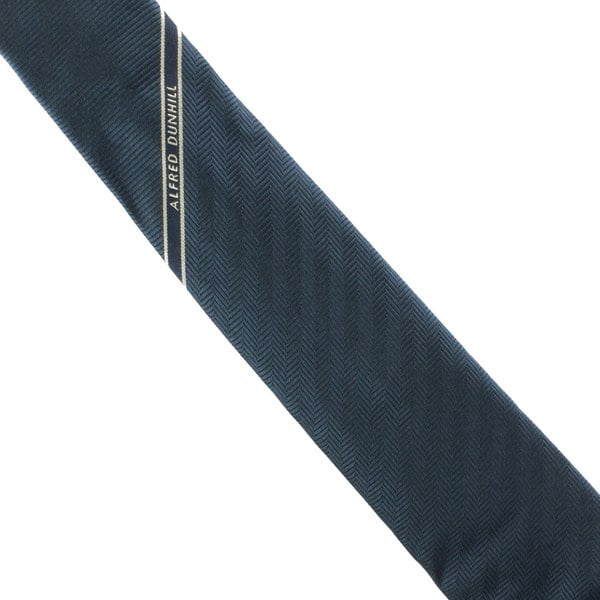 Dunhill luxuriously thick mulberry silk tie in a twill and herringbone pattern Single selvedge logo stripe to the blade