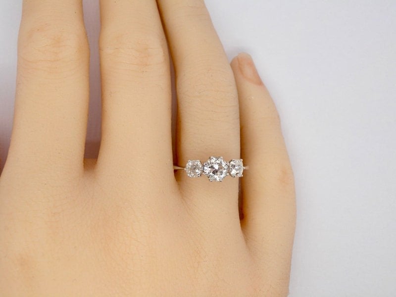 A three stone Diamond Ring finger view