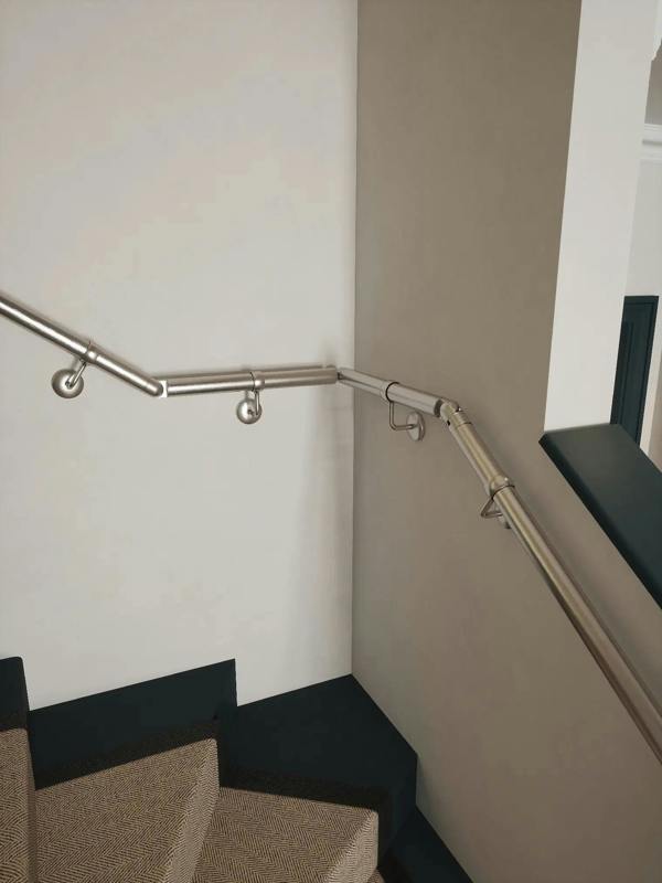 close up single winder handrail brushed silver