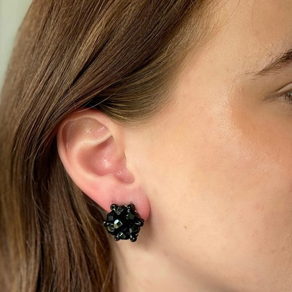 Black clip-on earrings, faceted black beads, clustered design, vintage inspired style, lightweight and comfortable, elegant statement jewellery
