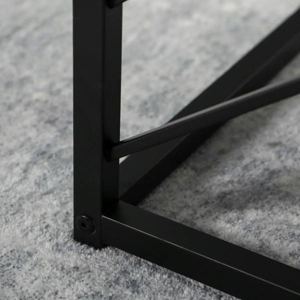 Close-up of black metal table leg base with corner bracket and screws