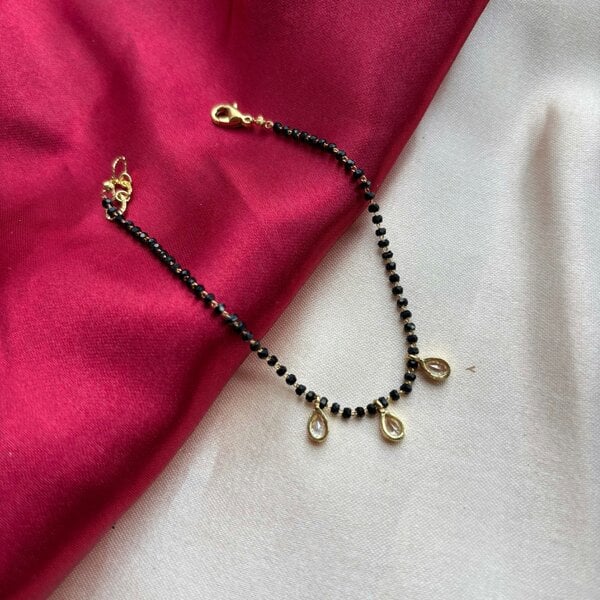 The Colourful Aura Elegant Black Beaded Nazar mangalsutra Dangle Zircon Bracelet