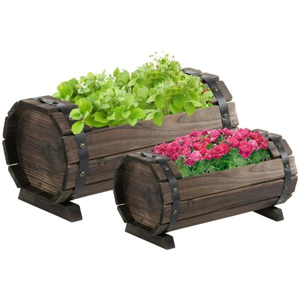 Two-piece dark brown wooden planter boxes with metal-bolted corner braces and flowers
