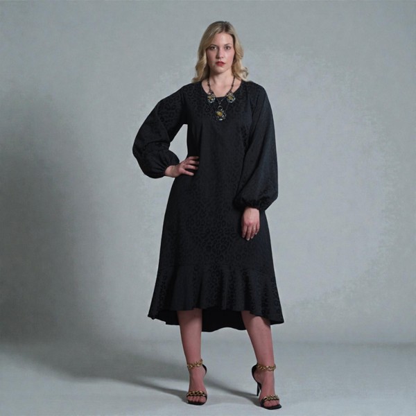 Women's Aphrodite Black Leopard Jacquard Dress, styled with black heels for a chic, coordinated look.