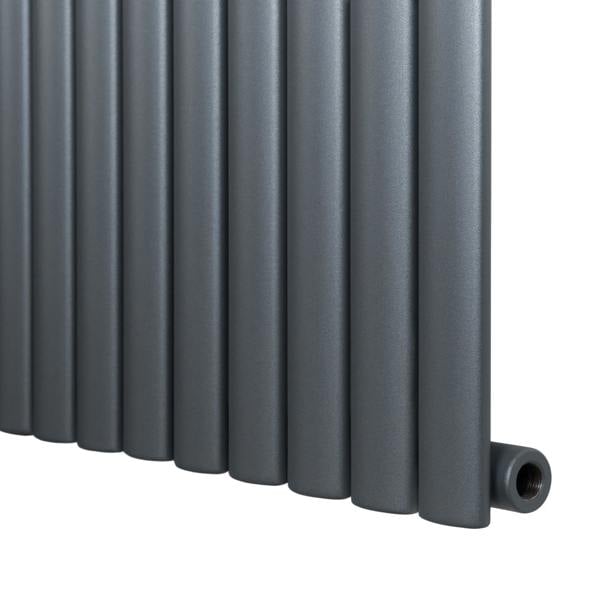 Oval single column radiator in anthracite grey, featuring a sleek, modern design with smooth, matte finish and rounded edges