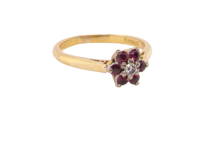 A ruby and diamond cluster ring