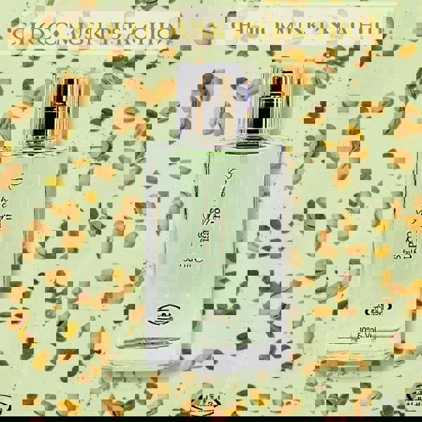 Perfume bottle labeled 'Choco Musk Pistachio' on a background with pistachios